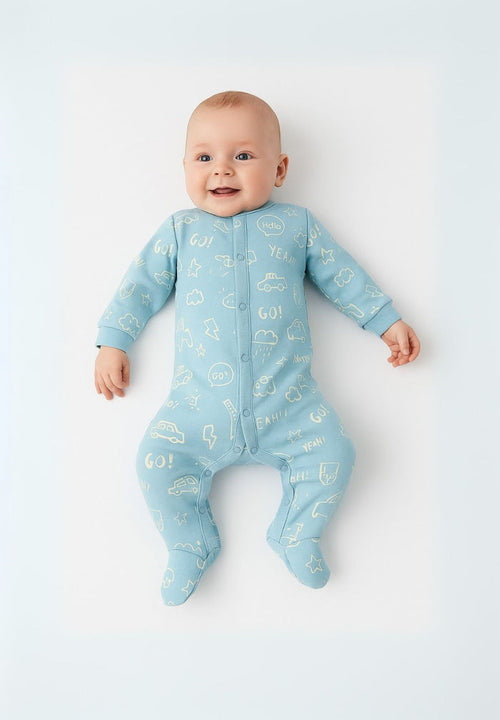 Boys long sleeve sleepsuit in light blue with printed patterns, front view.