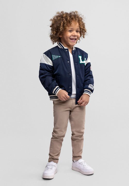 Boys navy padded varsity bomber jacket, front view with snap fasteners and side pockets.