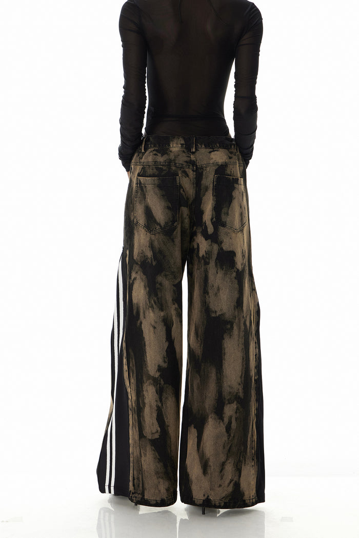 Caprina Zipper Tie Dye Jeans In Black