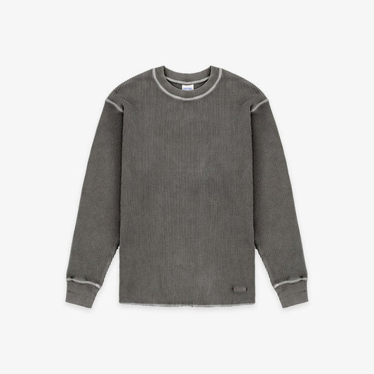 A dark gray ribbed knit long-sleeve shirt with contrasting light gray trim around the crew neck, sleeve seams, and cuffs, shown flat on a light gray background.