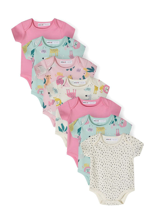 Seven-pack of girls' short sleeve bodysuits in various colors with playful prints, front view.