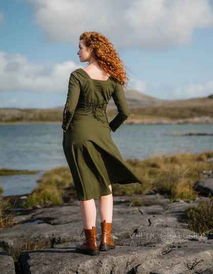 Imbas Corset Dress back view, romantic lace up back midi dress in dark green with a flowing skirt