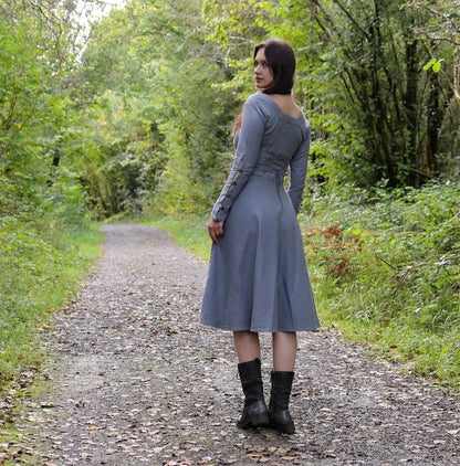 Cotton corset back midi dress with adjustable lacing, square back neckline, buttoned sleeves and full skirt.
