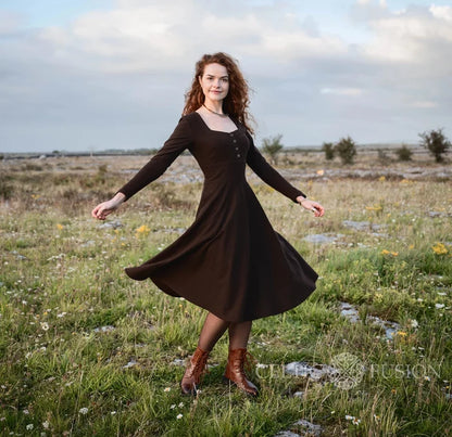 Brown long sleeve corset midi dress with square neckline, button front and flowing full-circle skirt.