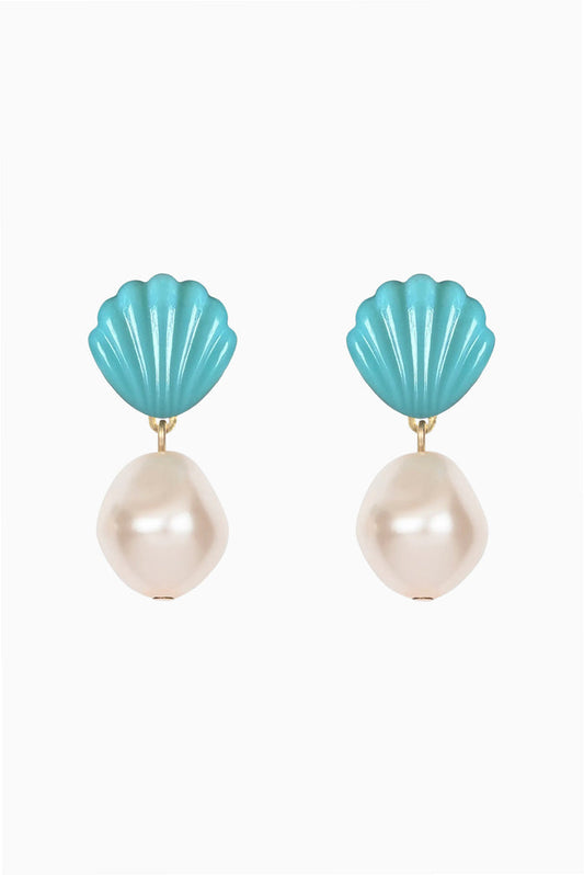 A pair of drop earrings featuring turquoise blue scallop-shaped tops and large, lustrous cream pearl drops, set with small gold accents on a plain white background.