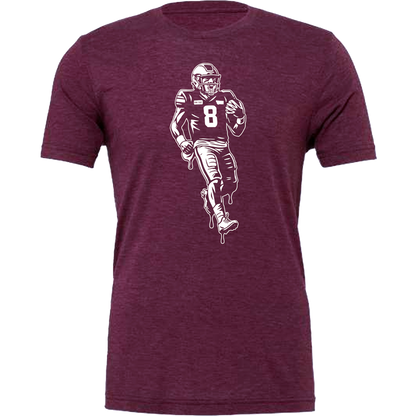 Maroon t-shirt with a graphic of a football player running, on a white background