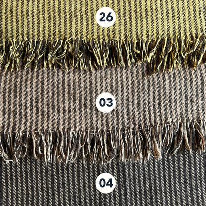 Wool blend shawl colour options with handwoven striped texture and fringe edge in earthy folklore tones